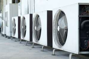 multiple commercial air conditioning units in a row